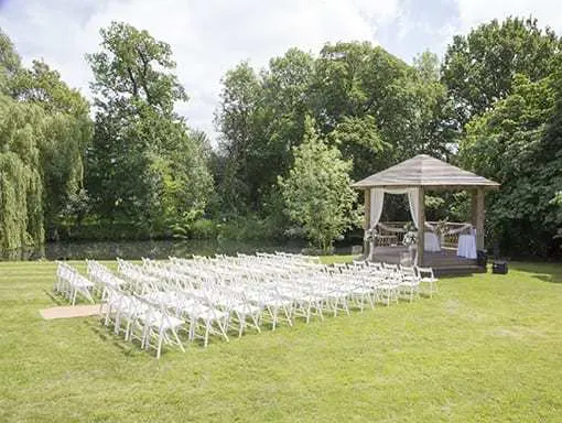 Outdoor wedding gazebo next to the lake