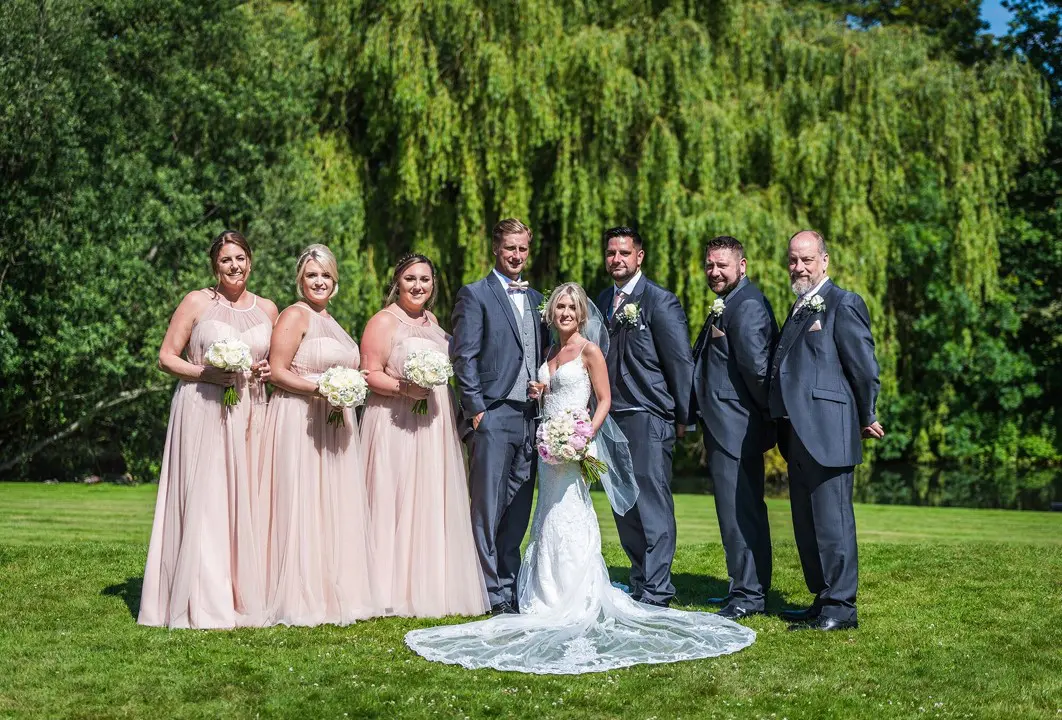 Rosa And Alex Wedding Stories at That Amazing Place Wedding Venue Harlow Wedding Dress Full Bride Groom and Bridesmaids