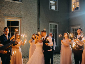 Samantha and Andrew Wedding at That Amazing Place Harlow Essex Wedding Venue Celebrating with sparklers