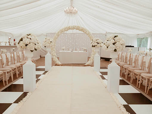 Marquee wedding ceremony at That Amazing Place wedding venue Old Harlow Essex