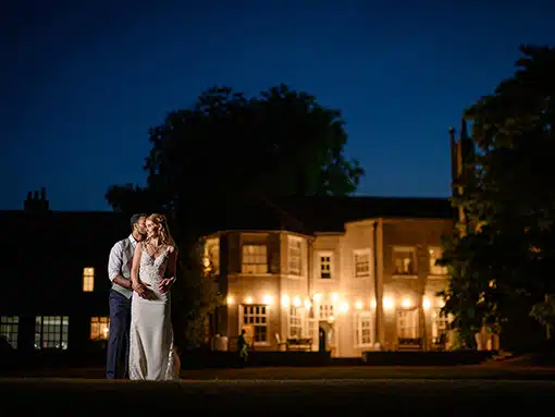 Bride and Groom evening photo in gardens at That Amazing Place Essex Wedding Venue