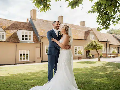 Bride and Groom in grounds at That Amazing Place Essex Wedding Venue with Accommodation