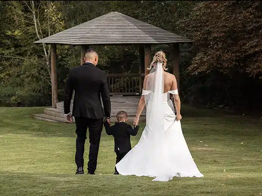 Bride and Groom with son at That Amazing Place Essex Wedding Venue with Accommodation