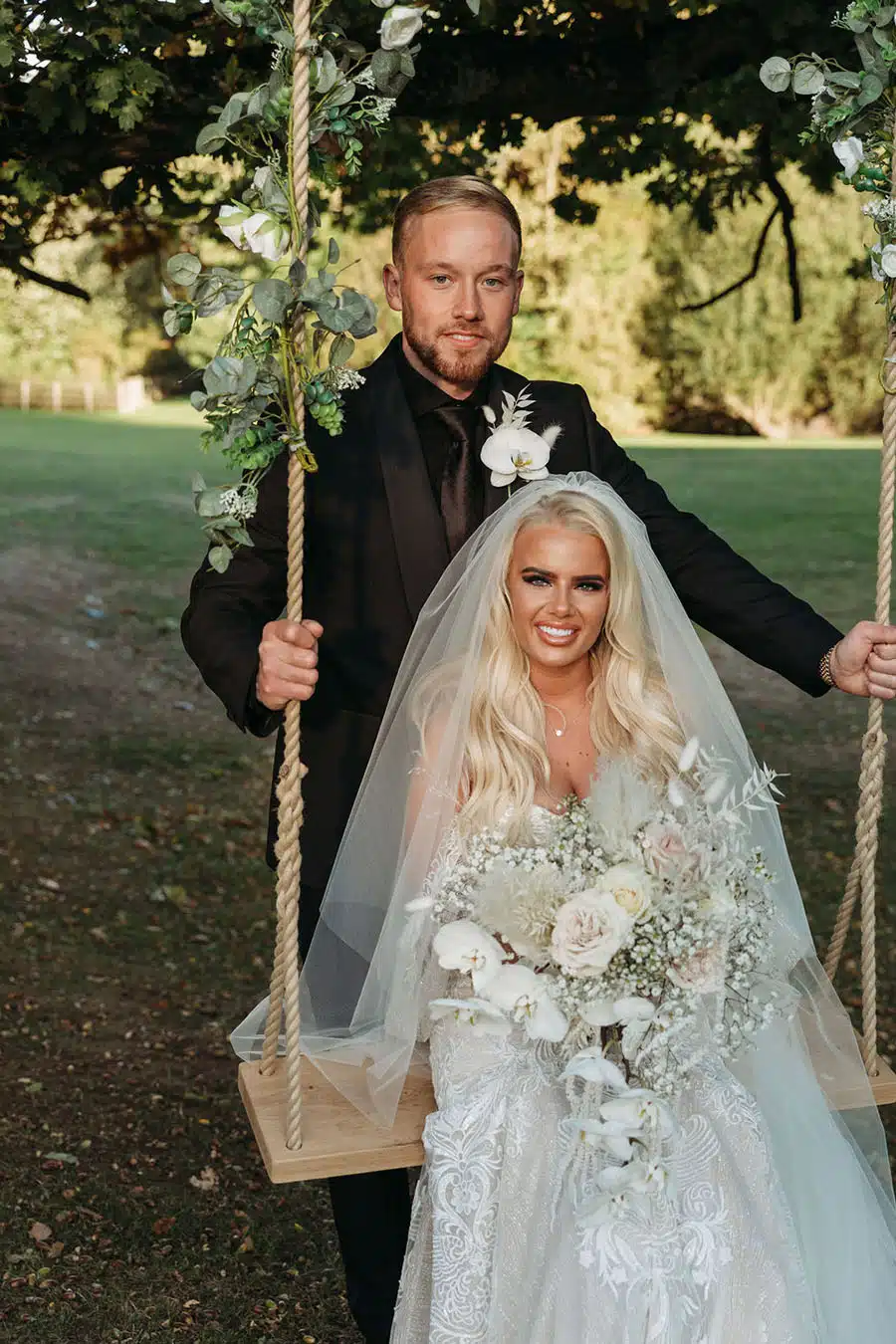 Bride and groom on Swing at That Amazing Place Essex Wedding Venue