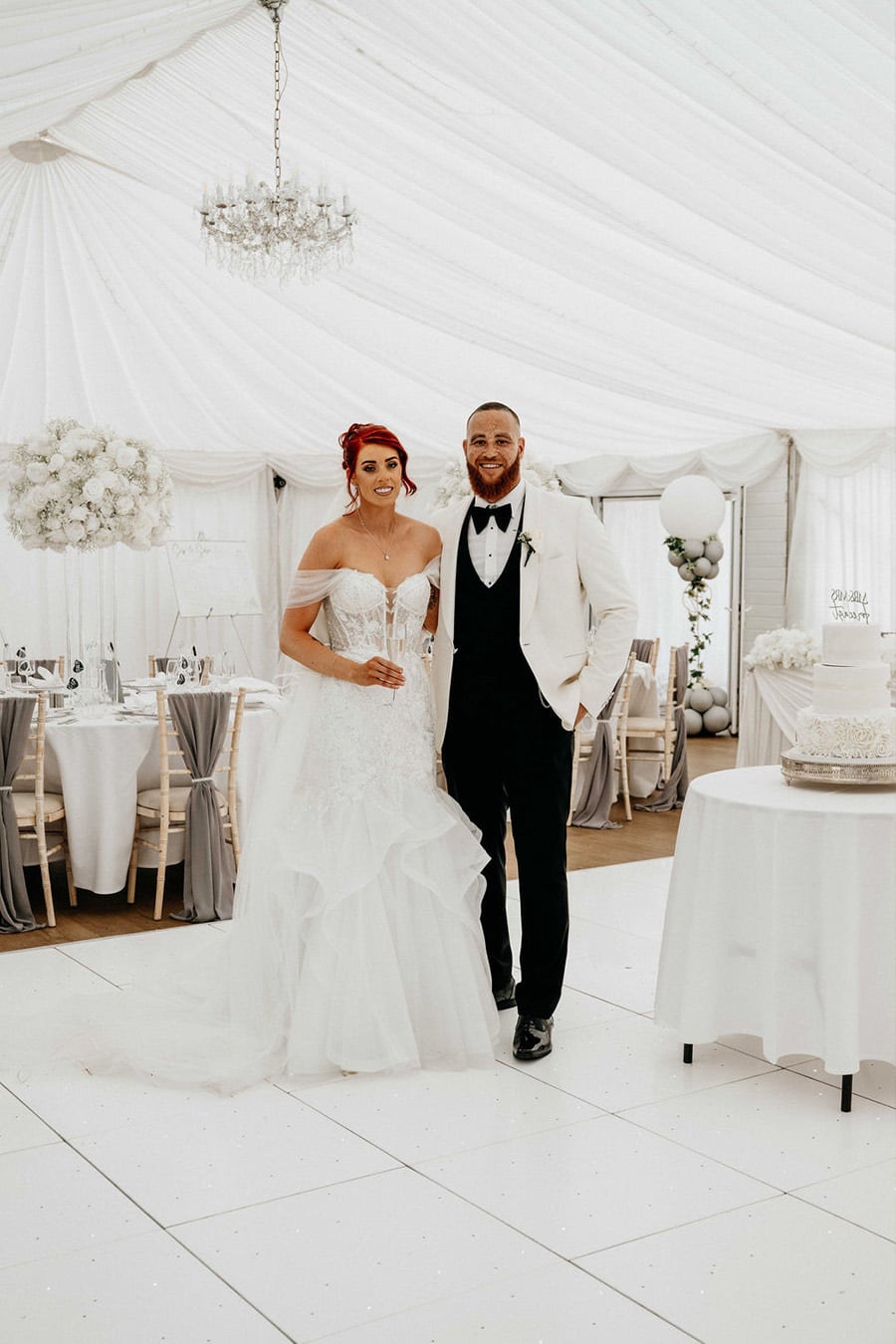 Faye & Craig in marquee at That Amazing Place Essex Exclusive Wedding Venue by Carly Brown Photography