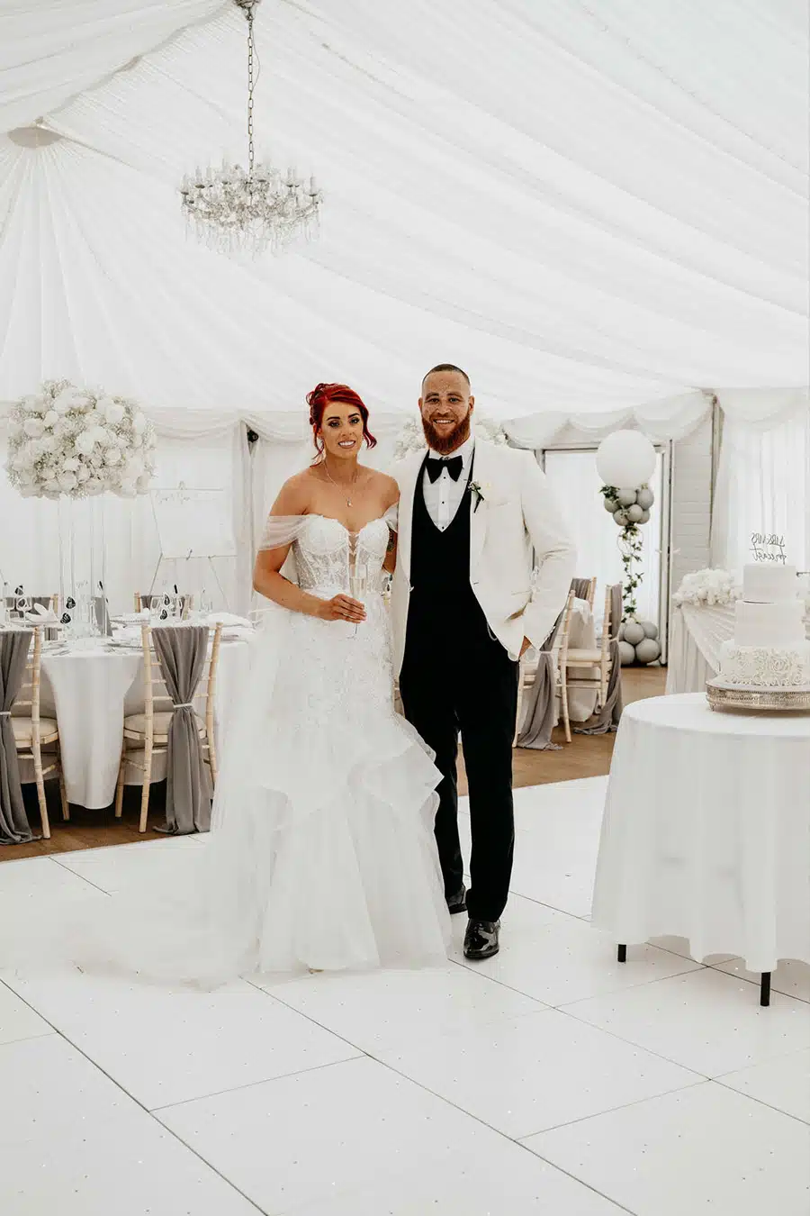 Faye & Craig in marquee at That Amazing Place Essex Exclusive Wedding Venue by Carly Brown Photography