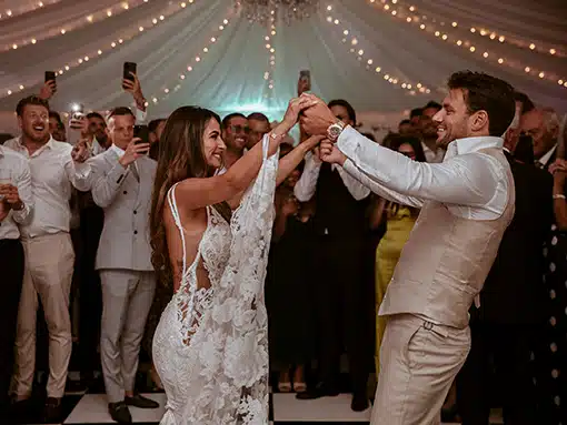 Bride and groom dancing in marquee for evening reception wedding at That Amazing Place Essex
