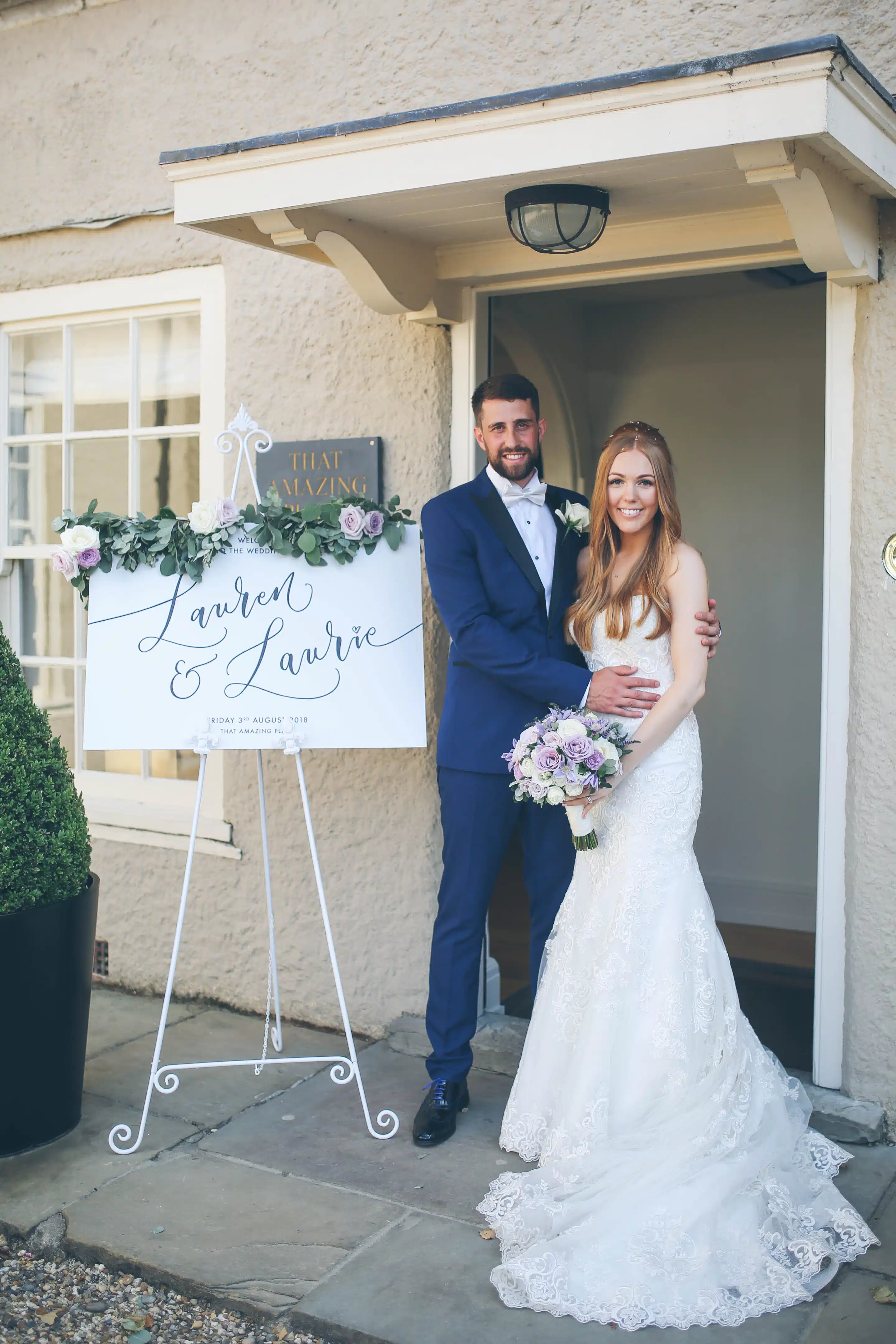 Bride and groom at front door of That amazing Place essex Wedding venue