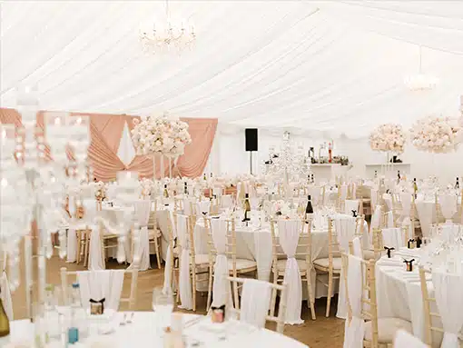 Marquee set up top table by Sophie's Boutique Bows at That Amazing Place Essex Wedding Venue