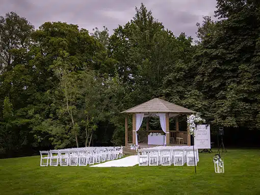 Outdoor ceremomy aisle at That Amazing Place Exclusive Essex Wedding Venue
